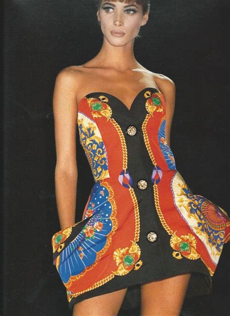 cream vintage versace couture dress|old fashioned Versace jewelry.